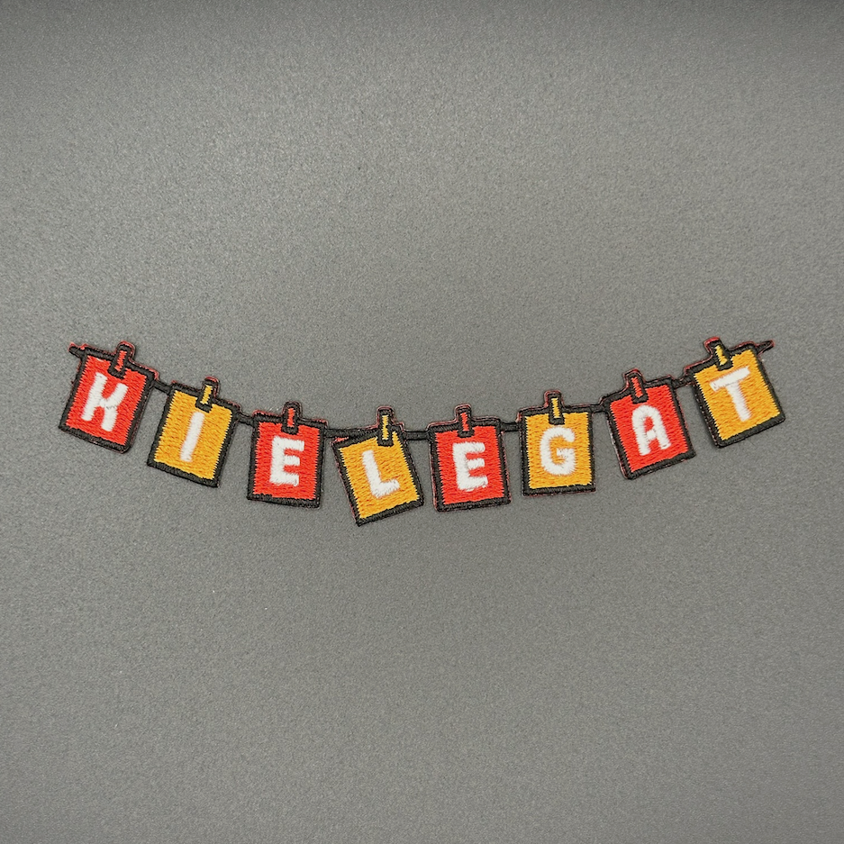 Slinger met text: "KIELEGAT", in kleur rood / oranje